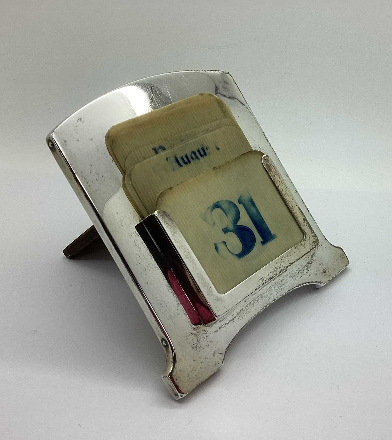 Lot 79 - A Hallmarked Silver Mounted Desk Calendar,...
