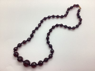 Lot 182 - A Cherry Amber Coloured Faceted Bead Necklace,...