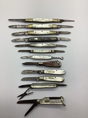 Lot 335 - A Collection of Mother of Pearl Scale Folding...