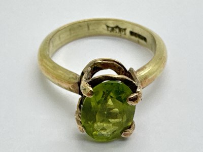 Lot 83 - A 9ct Gold Single Stone Ring, high oval claw...