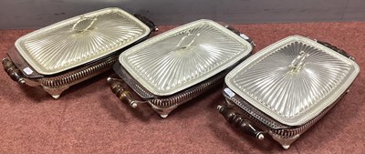 Lot 235 - A Set of Three Pyrex Lined Serving Dishes,...