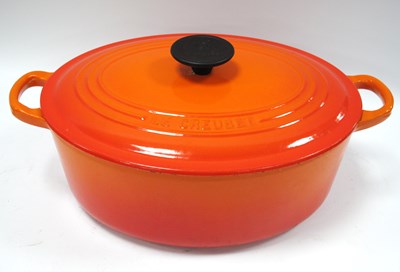 Lot 1436 - Le Creuset Oval Lidded Casserole Pan in Orange...
