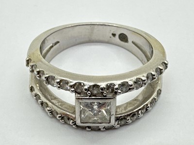 Lot 75 - A Diamond Set Dress Ring, the princess cut...