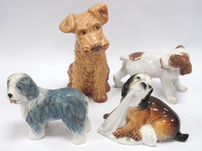 Lot 1229 - Royal Copenhagan Puppy Dog '444', 11.5cm tall,...