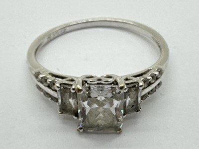 Lot 74 - A Modern CZ Set Three Stone Ring, graduated...
