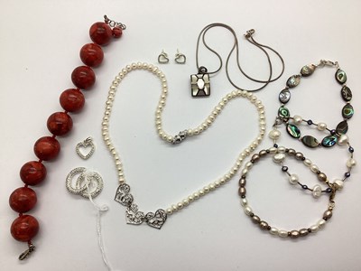 Lot 172 - A Large Coral Beaded Bracelet, to "925" clasp,...