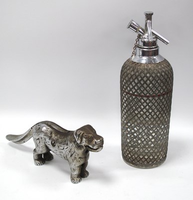 Lot 1425 - Chromed Cast Iron Nutcracker as a Dog, 28.5cm...