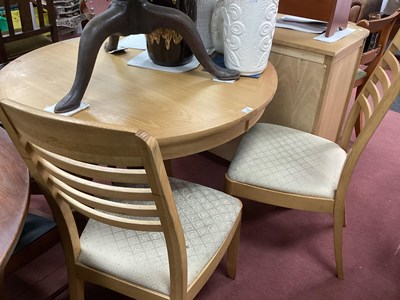 Lot 1559 - Lightwood Extending Circular Topped Dining...