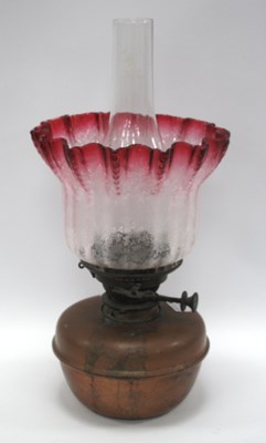 Lot 1347 - Copper Oil Lamp, with cranberry frill tinted...