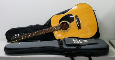 Lot 324 - Saxon Acoustic Guitar, No 58109 with spare case.