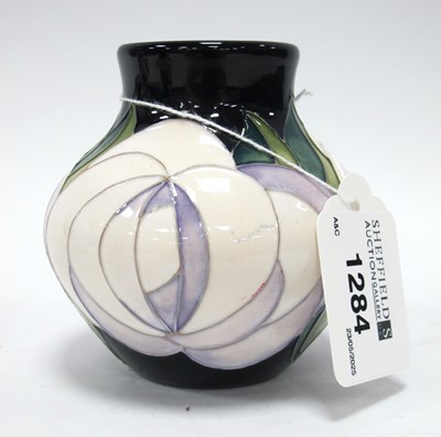 Lot 1284 - A Moorcroft Pottery Vase, decorated in the...