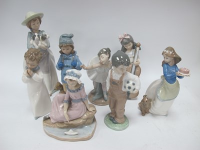 Lot 1271 - A large collection of Nao figurines to include...