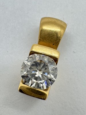Lot 115 - A Single Stone Inset Pendant, the circular cut...