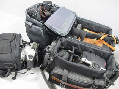 Lot 1062 - Cameras; A quantity of film cameras to include...
