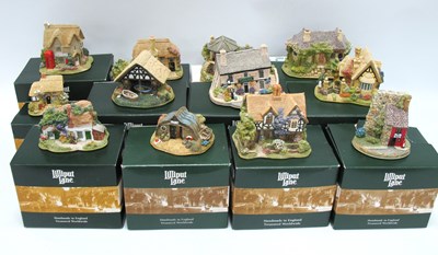 Lot 1266 - Lilliput Lane; A collection of boxed models to...