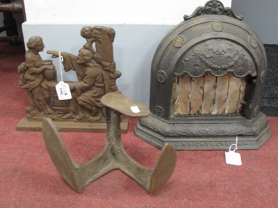Lot 1492 - XIX Century Cast Iron Door Stop, as figures at...