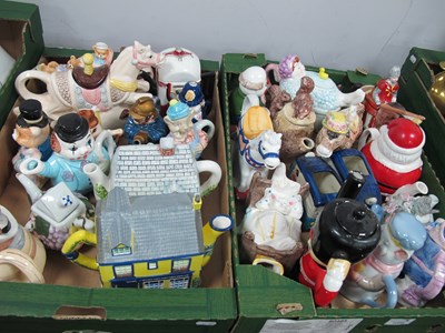 Lot 1048 - A large collection of novelty teapots to...