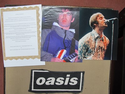 Lot 728 - Liam and Noel Gallagher Signed Photographs...