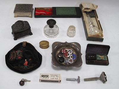 Lot 1388 - A collection of badges including a silver...