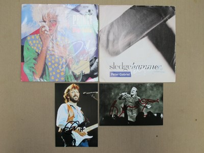 Lot 709 - Eric Clapton and Bono Signed Photographs,...