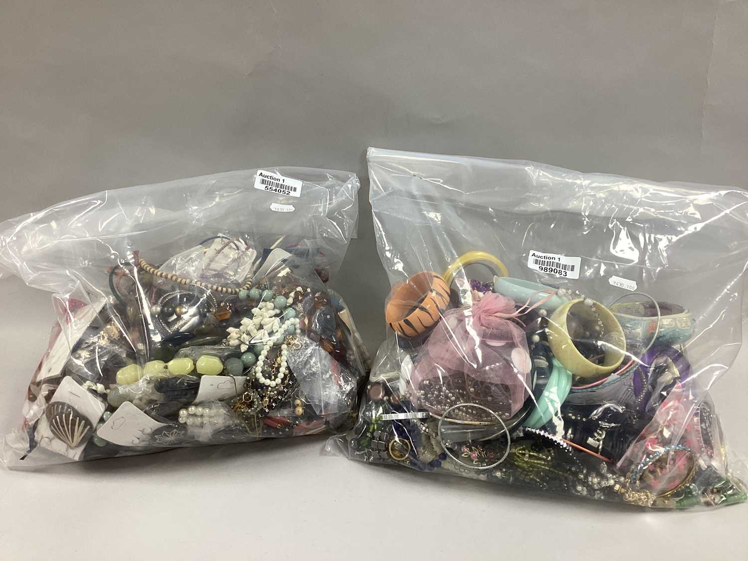 Lot 39 - A Mixed Lot of Assorted Costume Jewellery :-...