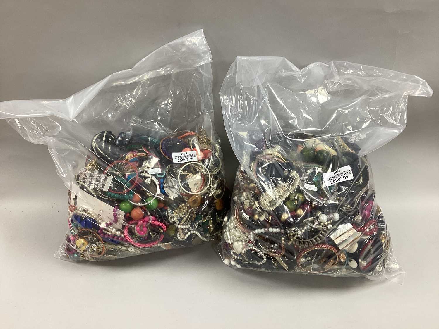 Lot 40 - A Mixed Lot of Assorted Costume Jewellery :-...