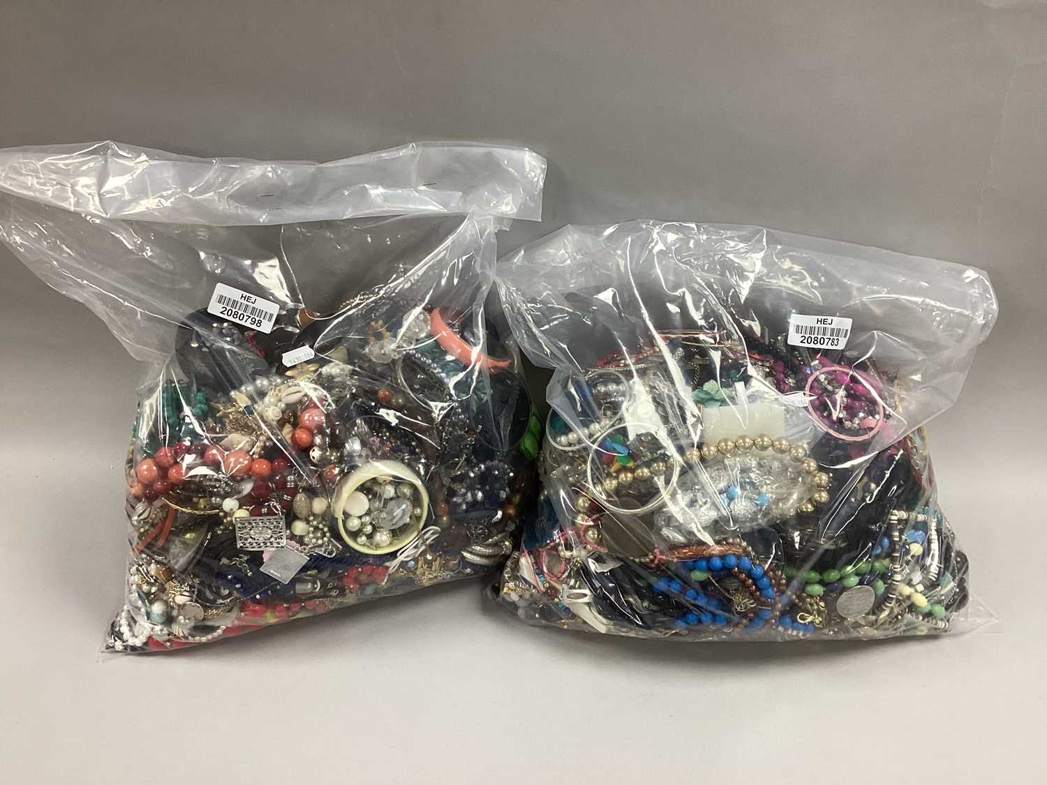 Lot 42 - A Mixed Lot of Assorted Costume Jewellery :-...