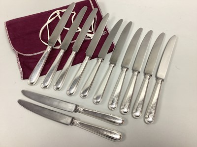 Lot 94 - A Matched Set of Twelve Hallmarked Silver...