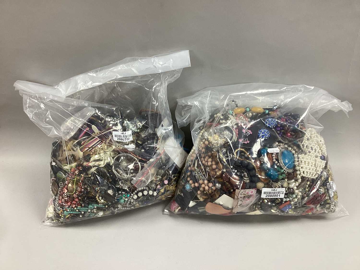 Lot 44 - A Mixed Lot of Assorted Costume Jewellery :-...