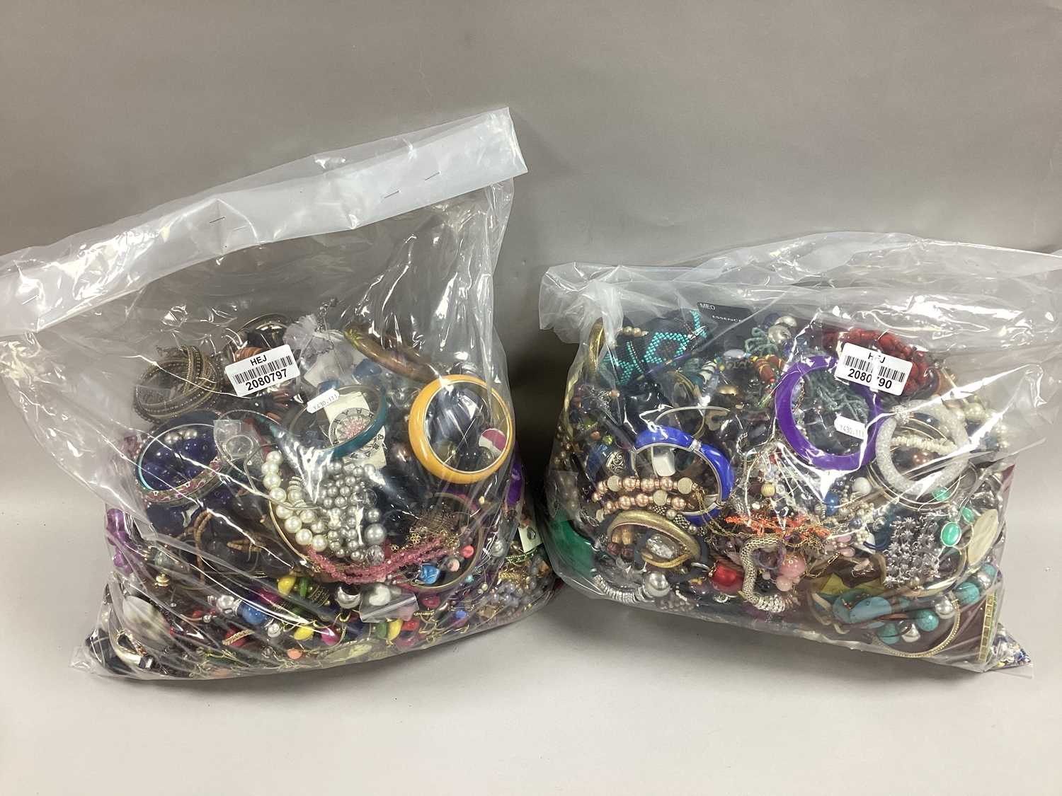 Lot 75 - A Mixed Lot of Assorted Costume Jewellery :-...