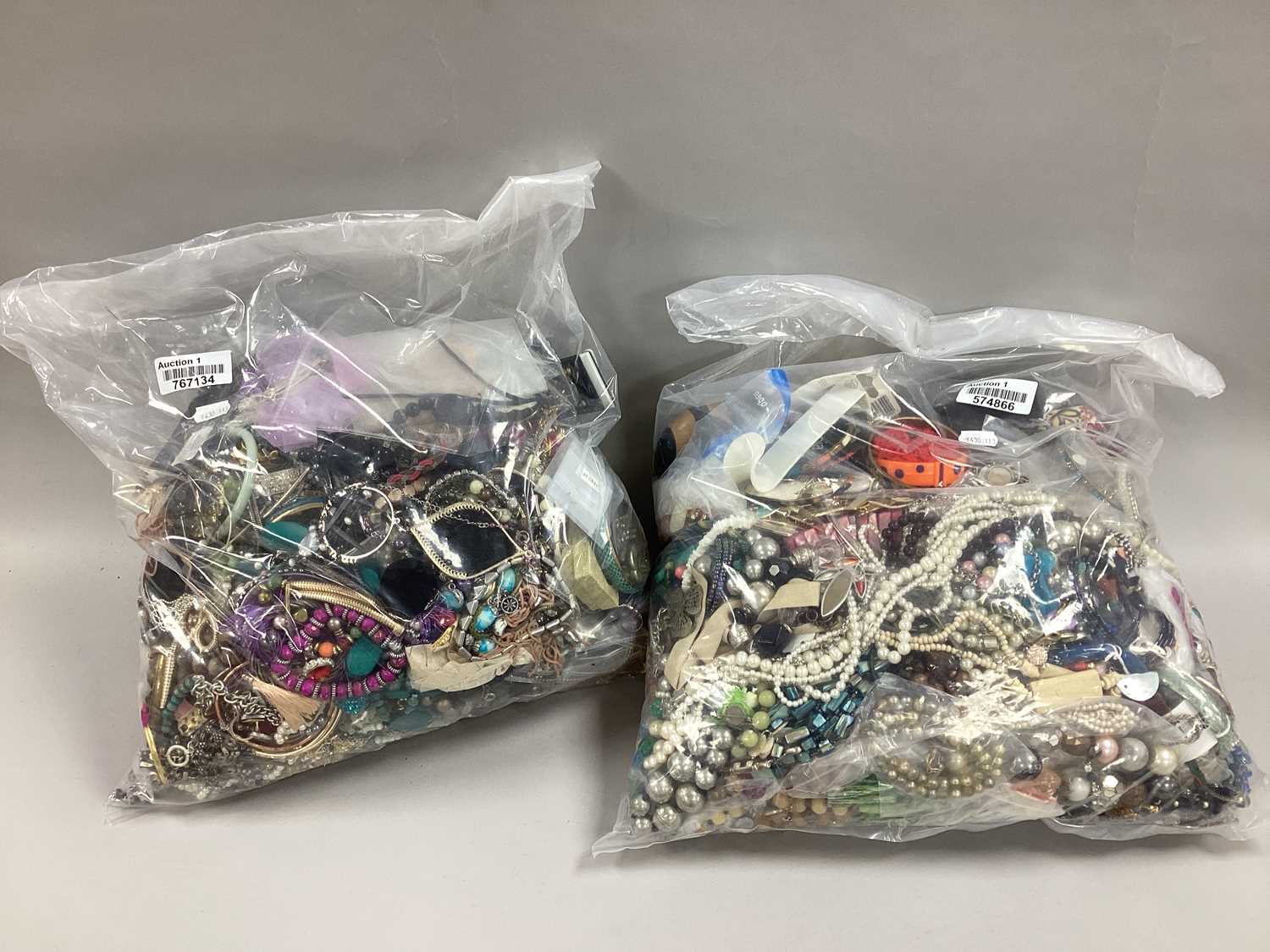 Lot 37 - A Mixed Lot of Assorted Costume Jewellery :-...
