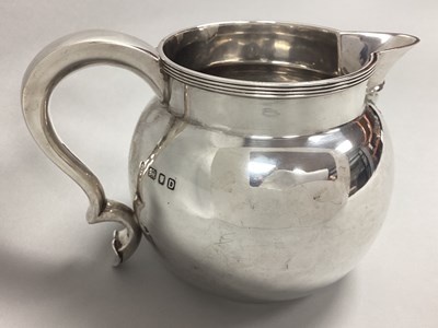 Lot 45 - A Hallmarked Silver Jug, BBS, London 1939, of...