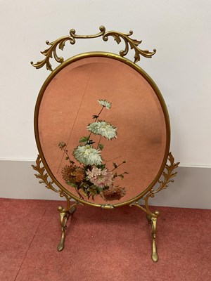 Lot 1647 - A Late Victorian Brass Framed Firescreen, the...