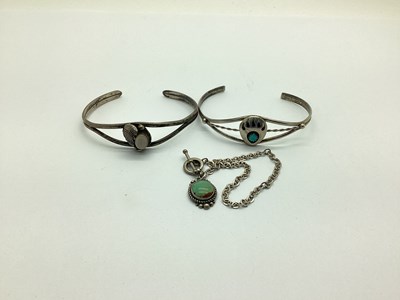 Lot 143 - Two Openwork Bangles, each with inset...