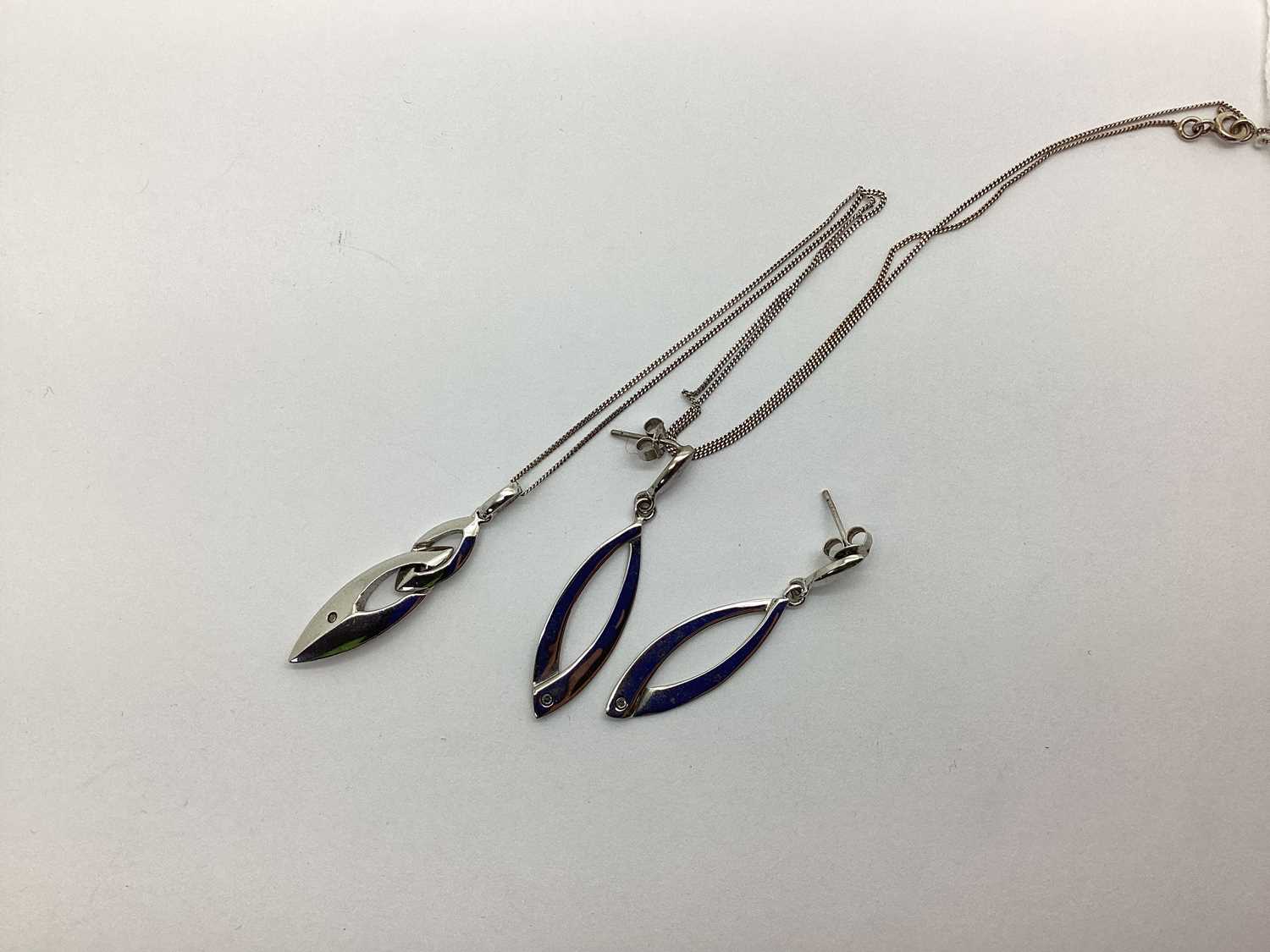 Lot 144 - A Modern "925" Diamond Set Pendant, on a chain;...