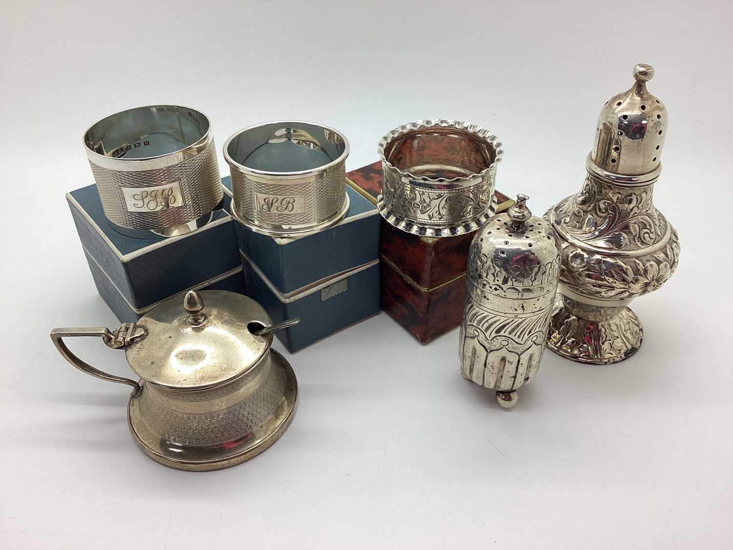 Lot 14 - Three Hallmarked Silver Napkin Rings, boxed;...