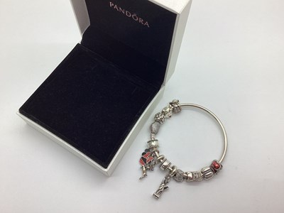 Lot 234 - Pandora; A Modern Charm Bangle, with heart...