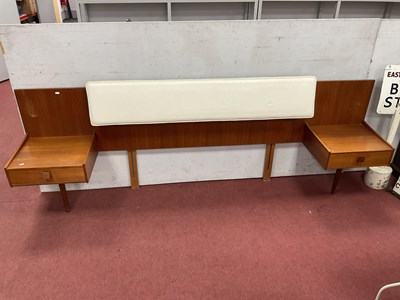Lot 1556 - G-Plan teak and white vinyl headboard with two...