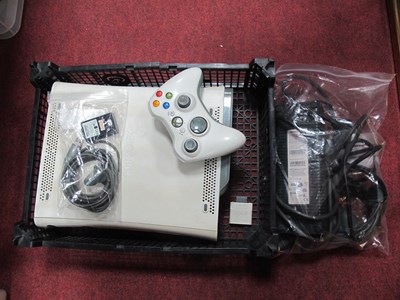 Lot 671 - A Microsoft XBOX 360 gaming console, together...