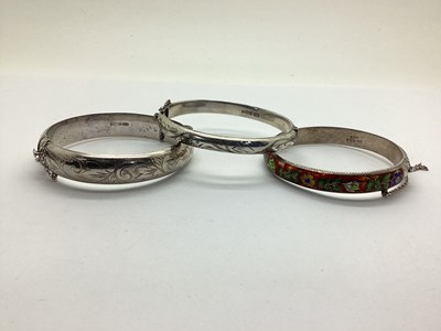 Lot 232 - A Hallmarked Silver Hinged Bangle, of etched...