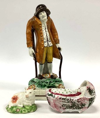 Lot 1130 - A Pearlware Pottery Figure of an Elderly...