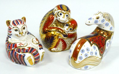 Lot 1070 - Three Royal Crown Derby Porcelain Paperweights,...