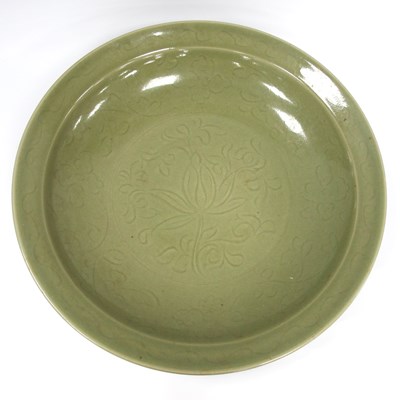 Lot 1199 - A Large Chinese Pottery Charger, decorated in...