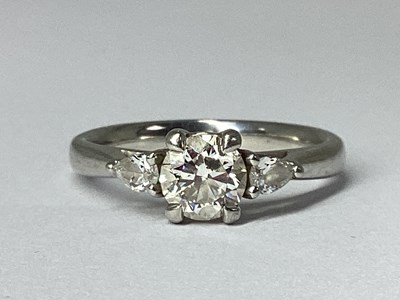 Lot 215 - A Modern 950 Platinum Three Stone Diamond Ring,...
