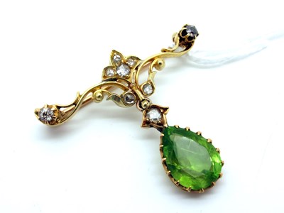 Lot 76 - An Edwardian Peridot and Diamond Set Brooch,...