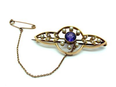 Lot 77 - An Edwardian Amethyst and Pearl Set Bar Brooch,...