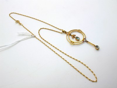 Lot 61 - An Edwardian Openwork Drop Pendant, oval...