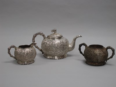 Lot 17 - A Chinese Three Piece Tea Set, each allover...