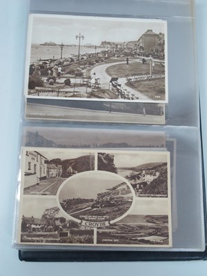 Lot 1421 - A Picture Postcard Album, containing early XX...