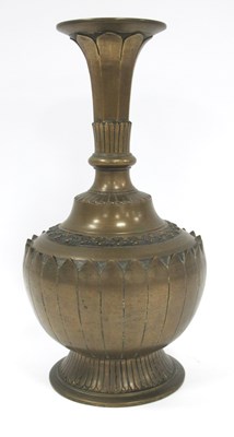 Lot 1194 - An Indian Bronze Mughal Surahi Bottle Vase,...